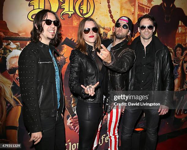 Halestorm lead singer Lzzy Hale and band members attend the 3rd Annual Watch Awards Gala at Avalon on March 17, 2014 in Hollywood, California.