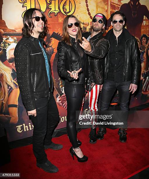 Halestorm lead singer Lzzy Hale and band members attend the 3rd Annual Watch Awards Gala at Avalon on March 17, 2014 in Hollywood, California.