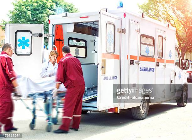 rescue team providing first aid - accident photos death stock pictures, royalty-free photos & images
