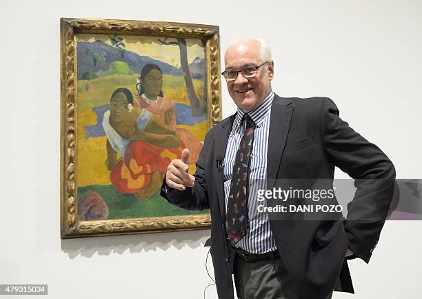 Swiss businessman and art collector Rudolf Staechelin poses past Paul Gauguin's "Nafea Ipoipo faa" , the most expensive painting ever sold, at the...