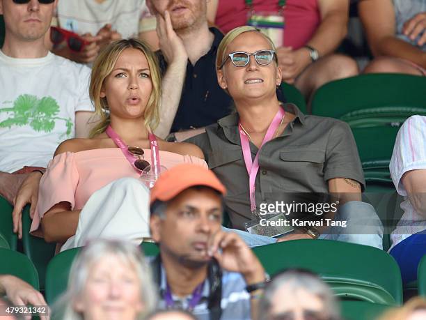 Emma Louise Connolly and Oliver Proudlock attend the Grigor Dimitrov v Richard Gasquet match on day five of the annual Wimbledon Tennis Championships...