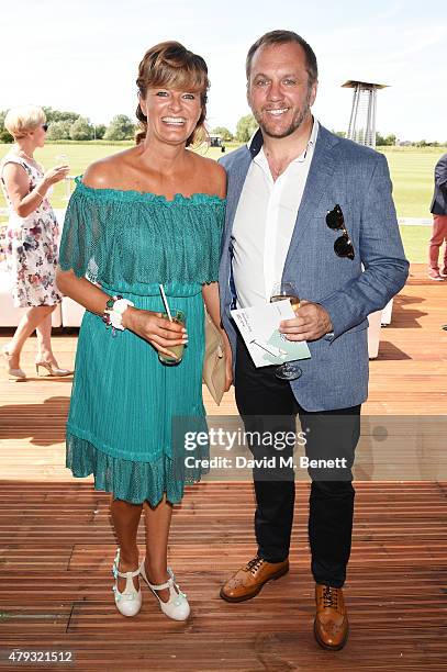 Dean Andrews and Helen Bowen-Green attend the Audi Polo Challenge 2015 at Cambridge County Polo Club on July 3, 2015 in Cambridge, England.