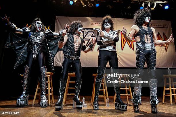Musicians Gene Simmons, Eric Singer, Tommy Thayer and Paul Stanley of KISS appear at a press conference to announce the KISS and Def Leppard '2014...