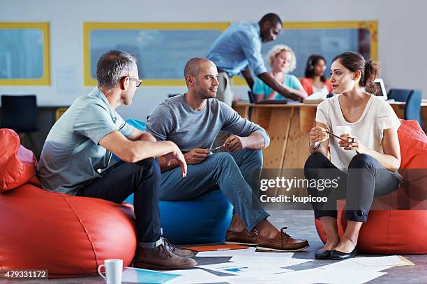 pooling their ideas - bean bags stock pictures, royalty-free photos & images