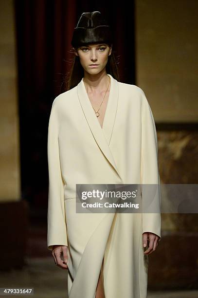 Model walks the runway at the Hermes Autumn Winter 2014 fashion show during Paris Fashion Week on March 5, 2014 in Paris, France.