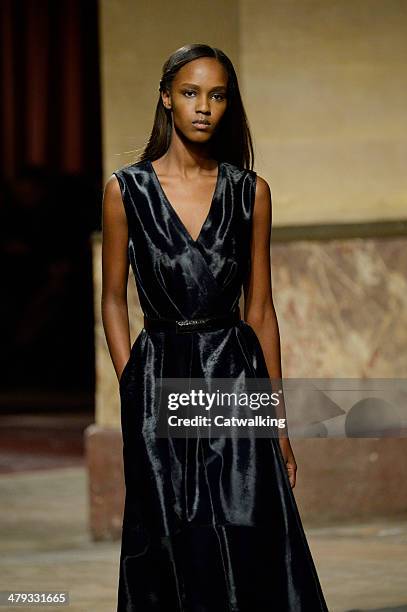 Model walks the runway at the Hermes Autumn Winter 2014 fashion show during Paris Fashion Week on March 5, 2014 in Paris, France.