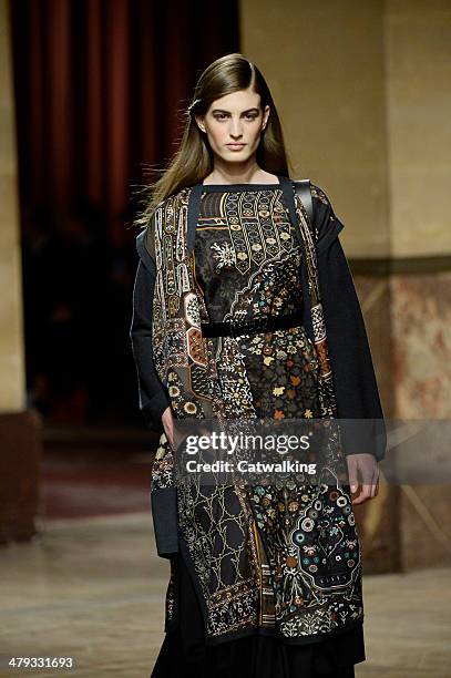 Model walks the runway at the Hermes Autumn Winter 2014 fashion show during Paris Fashion Week on March 5, 2014 in Paris, France.