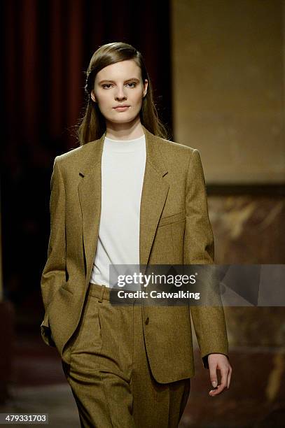 Model walks the runway at the Hermes Autumn Winter 2014 fashion show during Paris Fashion Week on March 5, 2014 in Paris, France.