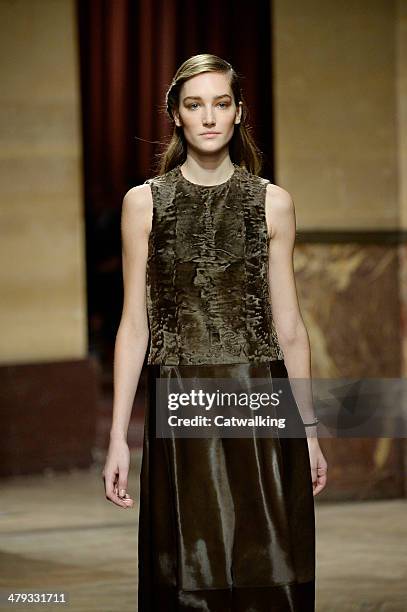 Model walks the runway at the Hermes Autumn Winter 2014 fashion show during Paris Fashion Week on March 5, 2014 in Paris, France.