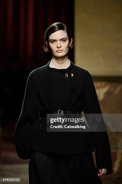 Model walks the runway at the Hermes Autumn Winter 2014 fashion show during Paris Fashion Week on March 5, 2014 in Paris, France.