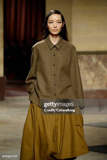 Model walks the runway at the Hermes Autumn Winter 2014 fashion show during Paris Fashion Week on March 5, 2014 in Paris, France.