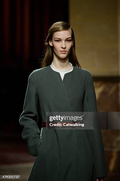 Model walks the runway at the Hermes Autumn Winter 2014 fashion show during Paris Fashion Week on March 5, 2014 in Paris, France.