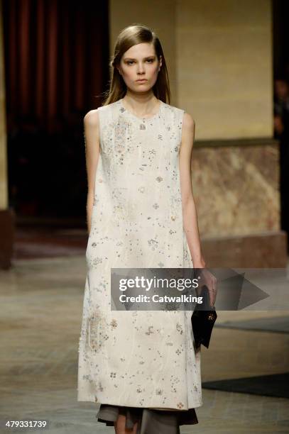 Model walks the runway at the Hermes Autumn Winter 2014 fashion show during Paris Fashion Week on March 5, 2014 in Paris, France.