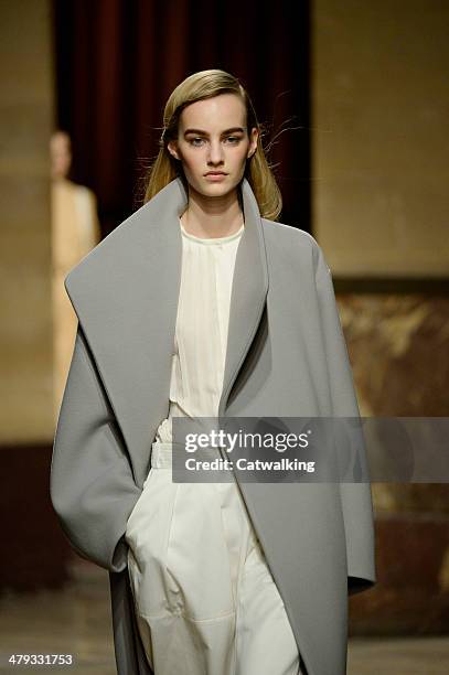 Model walks the runway at the Hermes Autumn Winter 2014 fashion show during Paris Fashion Week on March 5, 2014 in Paris, France.