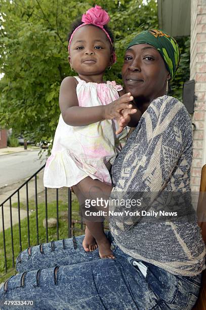 Jewel Miller holds her 1-year-old daughter, Legacy, whose father is Staten Island chokehold victim Eric Garner. Legacy is in line to receive the...