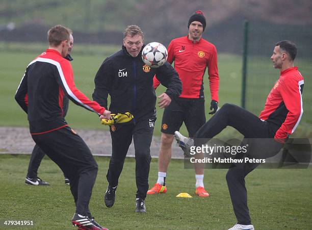 Darren Fletcher, Manager David Moyes and Ryan Giggs of Manchester United in action during a first team training session, ahead of their UEFA...