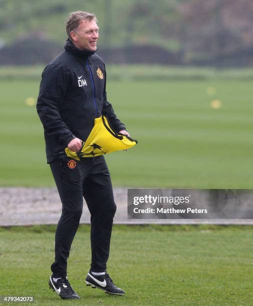 Manager David Moyes of Manchester United in action during a first team training session, ahead of their UEFA Champions League Round of 16 second leg...