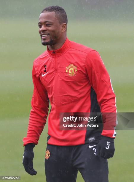 Patrice Evra of Manchester United in action during a first team training session, ahead of their UEFA Champions League Round of 16 second leg match...