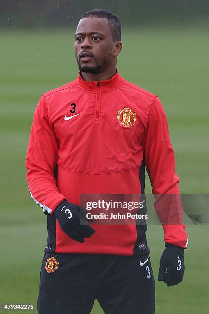 Patrice Evra of Manchester United in action during a first team training session, ahead of their UEFA Champions League Round of 16 second leg match...