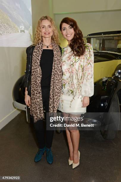 Bond girls Maryam d'Abo and Caterina Murino attend the 'Bond In Motion' photocall at the London Film Museum on March 18, 2014 in London, England.