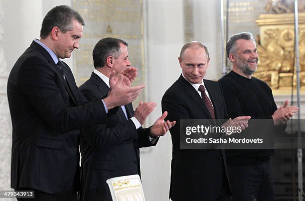 Crimea Prime Minister Sergei Aksyonov, Chairman of the Crimea State Council Vladimir Konstantinov, Russian President Vladimir Putin and Mayor of...