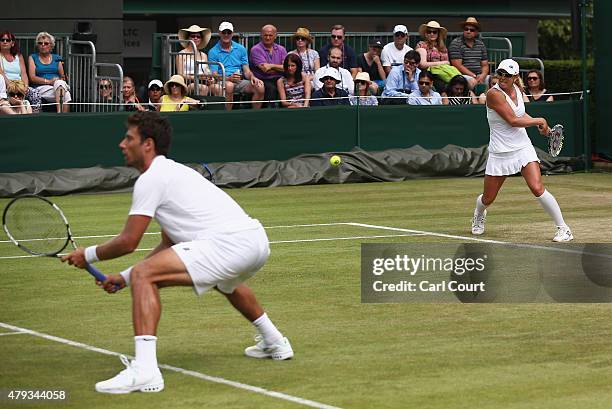 Artem Sitak of New Zealand and Anastasia Rodionova of Australia in action in their Mixed Doubles First Round match against Jonathan Marray of Great...