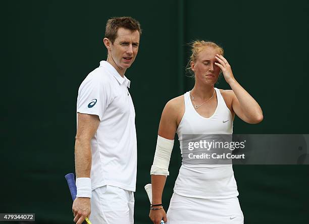 Jonathan Marray of Great Britain and Anna Smith of Great Britain react in their Mixed Doubles First Round match against Artem Sitak of New Zealand...