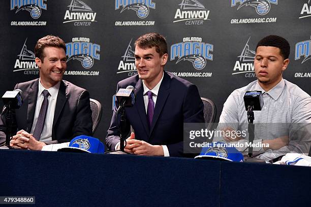 General Manager Rob Hennigan and Head Coach Scott Skiles introduce new Orlando Magic draft picks, Mario Hezonja and Tyler Harvey during a press...