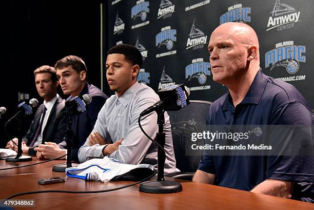 General Manager Rob Hennigan and Head Coach Scott Skiles introduce new Orlando Magic draft picks, Mario Hezonja and Tyler Harvey during a press...