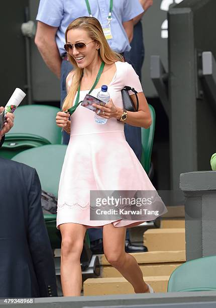 Jelena Djokovic attends the Novak Djokovic v Bernard Tomic match on day five of the annual Wimbledon Tennis Championships at Wimbledon on July 3,...