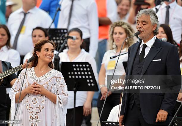 Italian singer Andrea Bocelli and Israeli singer Noa perform prior to the arrival of Pope Francis for a meeting with the Renewal in the Holy Spirit...