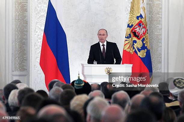 Russian President Vladimir Putin makes a speech during a signing ceremony at the Grand Kremlin Palace on March 18, 2014 in Moscow, Russia. President...