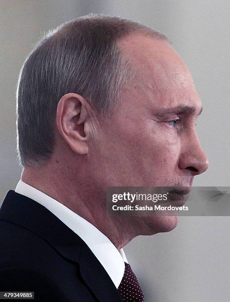 Russian President Vladimir Putin makes a speech during a signing ceremony at the Grand Kremlin Palace on March 18, 2014 in Moscow, Russia. President...