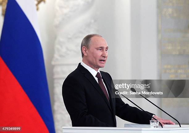 Russian President Vladimir Putin makes a speech during a signing ceremony at the Grand Kremlin Palace on March 18, 2014 in Moscow, Russia. President...