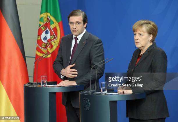 German Chancellor Angela Merkel and Portuguese Prime Minister Pedro Passos Coelho speak to the media following bilateral talks at the Chancellery on...