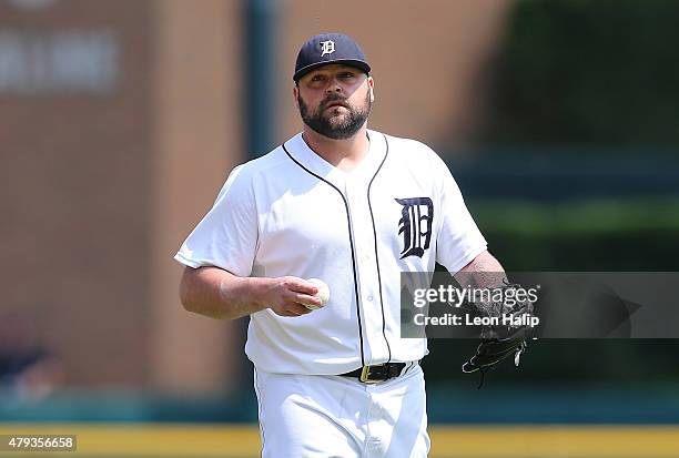 Joba Chamberlain of the Detroit Tigers looks into home plate during the eight inning of the interleague game against the Pittsburgh Pirates on July...