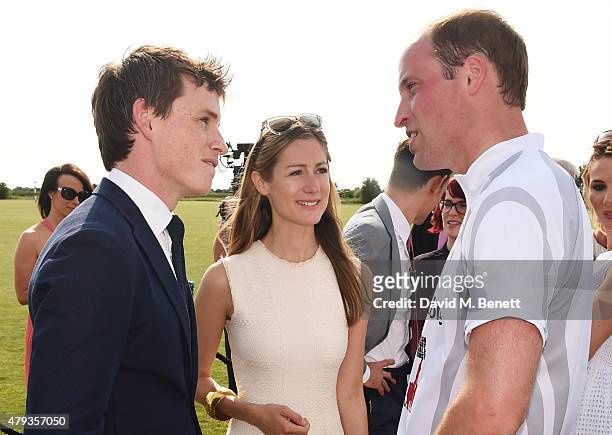 Eddie Redmayne, Hannah Bagshawe and Prince William, Duke of Cambridge, attend the Audi Polo Challenge 2015 at Cambridge County Polo Club on July 3,...