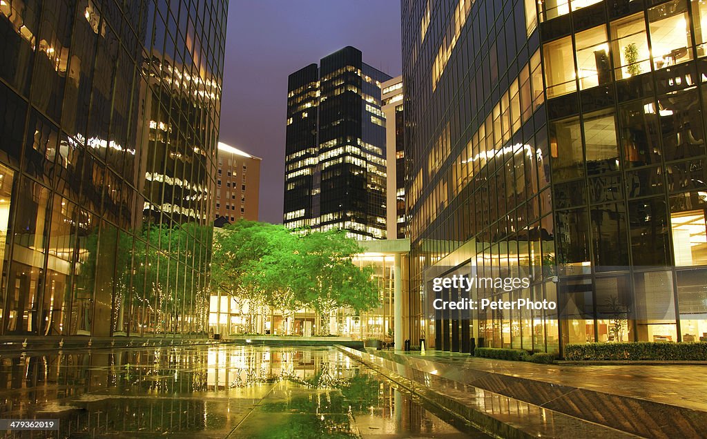 Town square with reflecting lights after rain