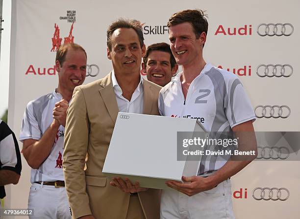 Prince William, Duke of Cambridge, Andre Konsbruck, Director of Audi UK, Malcolm Borwick and Ben Vestey attend the Audi Polo Challenge 2015 at...