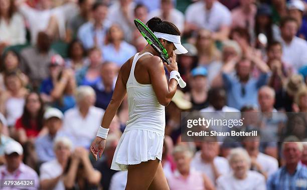 Heather Watson of Great Britain reacts in her Ladies Singles Third Round match against Serena Williams of the United States during day five of the...