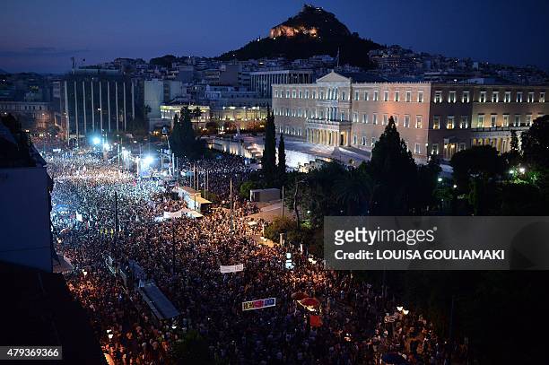 Thousands on 'NO' protesters gather in front of the parliament building in Athens on July 3, 2015. Greek Prime Minister Alexis Tsipras was cheered...