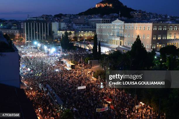 Thousands on 'NO' protesters gather in front of the parliament building in Athens on July 3, 2015. Greek Prime Minister Alexis Tsipras was cheered...