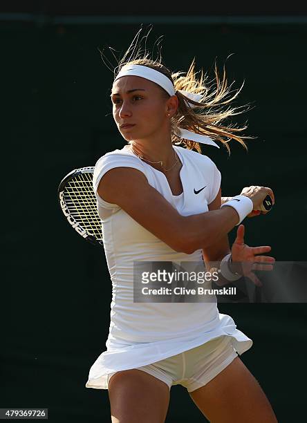 Aleksandra Krunic of Serbia plays a backhand in her Ladies Singles Third Round match against Venus Williams of the United States during day five of...