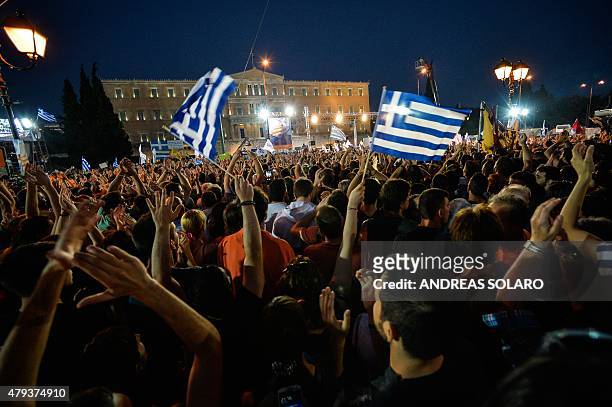 Thousands of 'NO' protesters gather in front of the parliament building in Athens on July 3, 2015. Greek Prime Minister Alexis Tsipras was cheered...