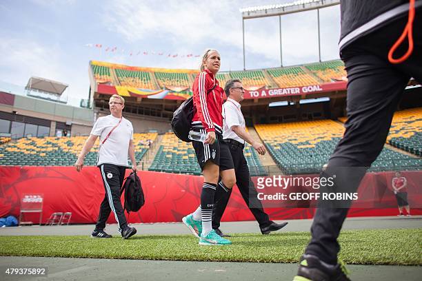 Germany's Lena Goessling takes to the pitch at commonwealth stadium for the team's training session at the 2015 FIFA Women's World Cup in Edmonton on...
