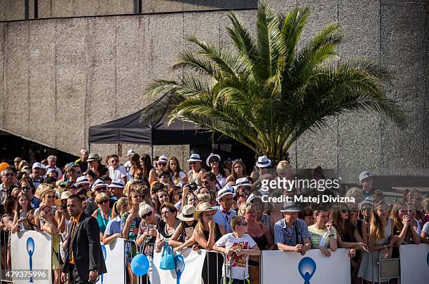 People wait for guests before the opening ceremony of the 50th Karlovy Vary International Film Festival on July 3, 2015 in Karlovy Vary, Czech...