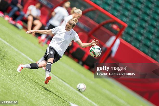 Germany's Simone Laudehr kicks the ball during the team's training session at the 2015 FIFA Women's World Cup in Edmonton on July 3, 2015. Germany...