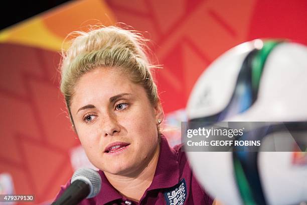 England's Steph Houghton responds to a question during a press conference at the FIFA Women's World Cup in Edmonton on July 3, 2015. England meets...