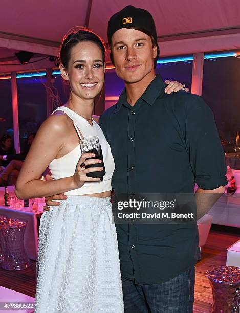 Rose Killin and Laurie Calvert attend the Audi Polo Challenge 2015 at Cambridge County Polo Club on July 3, 2015 in Cambridge, England.