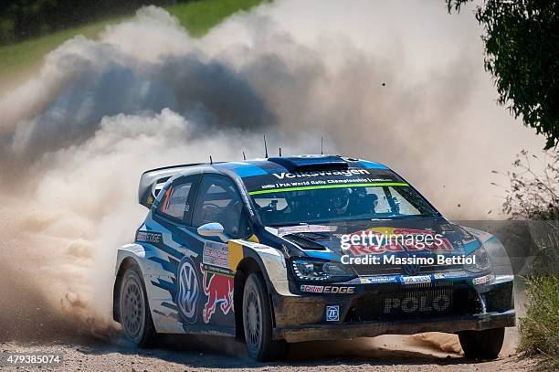 Sebastien Ogier of France and Julien Ingrassia of France compete in their Volkswagen Motorsport Volkswagen Polo R WRC during Day One of the WRC...